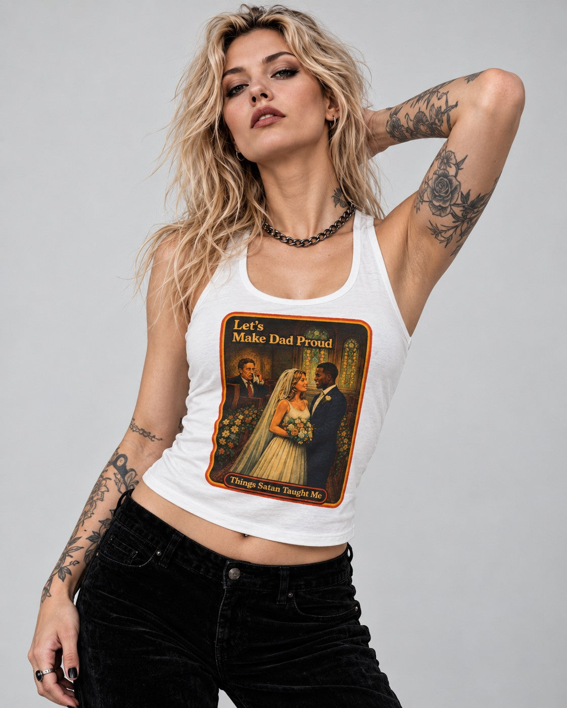 Model wearing the Let's Make Dad Proud racerback tank in white by Things Satan Taught Me