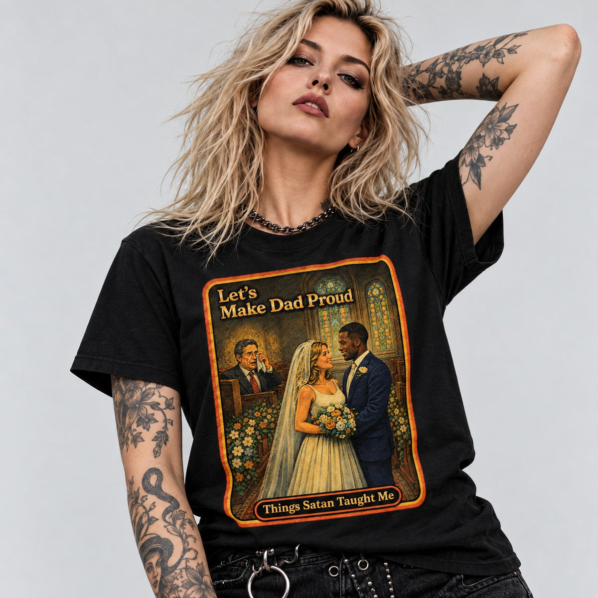 Model wearing the Let's Make Dad Proud women's tee in black by Things Satan Taught Me