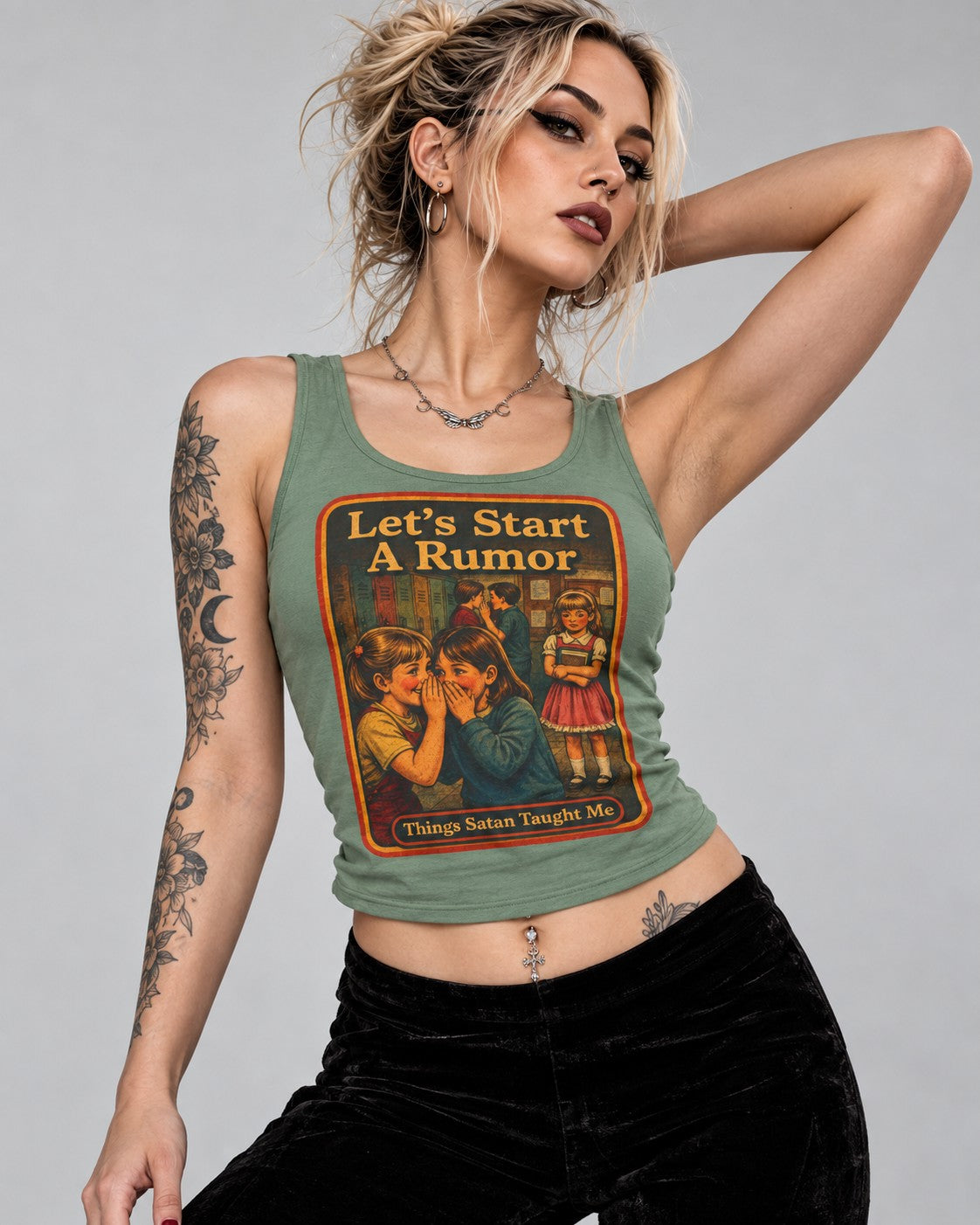 Model wearing the Let's Start A Rumor racerback tank in sage by Things Satan Taught Me