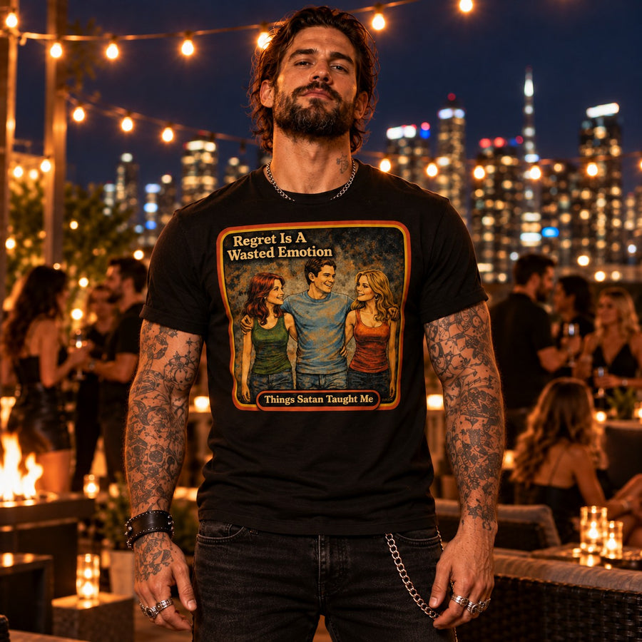 Model wearing the Regret Is A Wasted Emotion tee in black by Things Satan Taught Me
