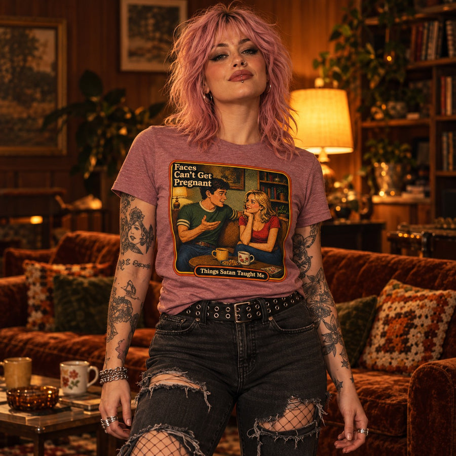 Model wearing the Faces Can't Get Pregnant tee in heather mauve by Things Satan Taught Me