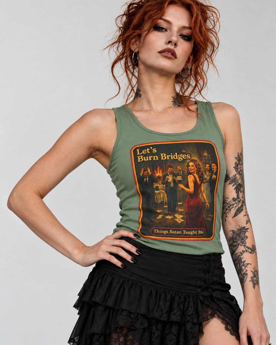 Model wearing the Let's Burn Bridges racerback tank in sage by Things Satan Taught Me