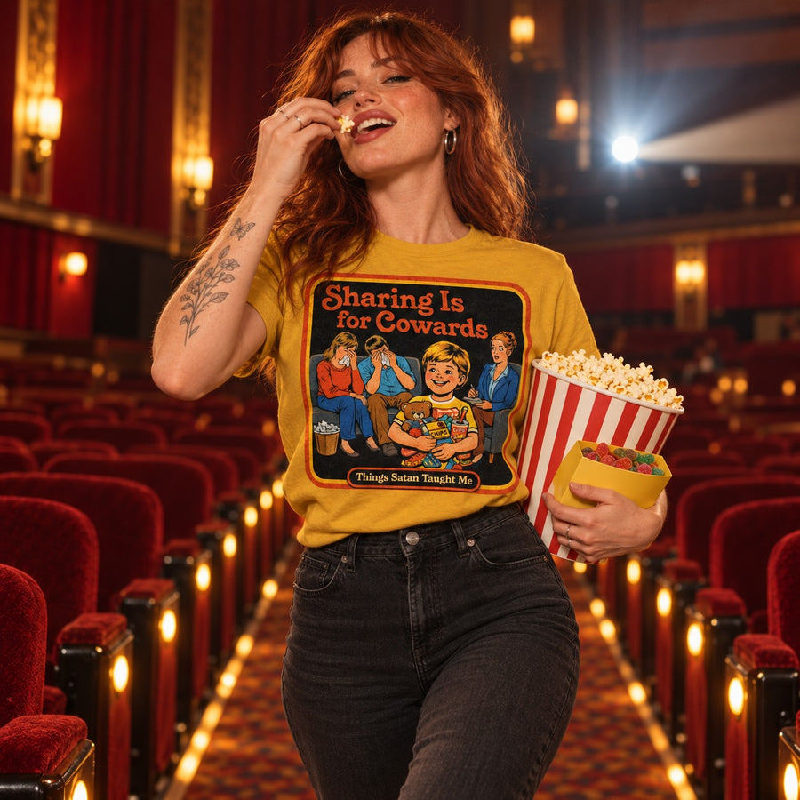 Model walking in the Sharing Is For Cowards tee in mustard by Things Satan Taught Me